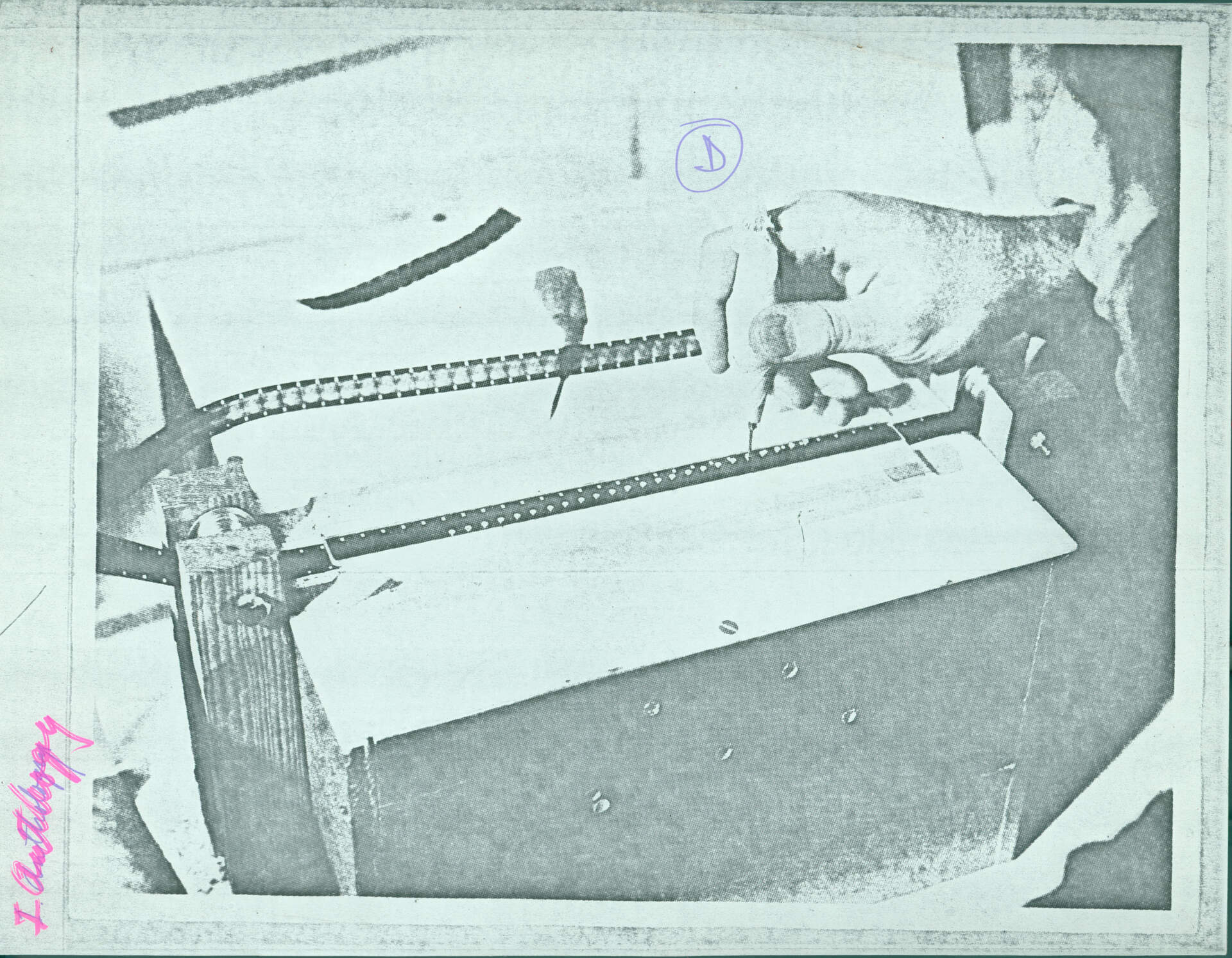 Untitled (Sharits working on film)