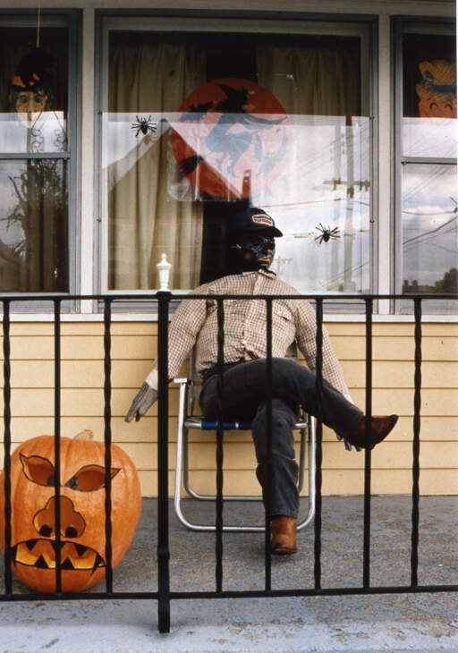 Porch dummy & jack-o-lantern, Swinburne St, Buffalo, NY, 1988