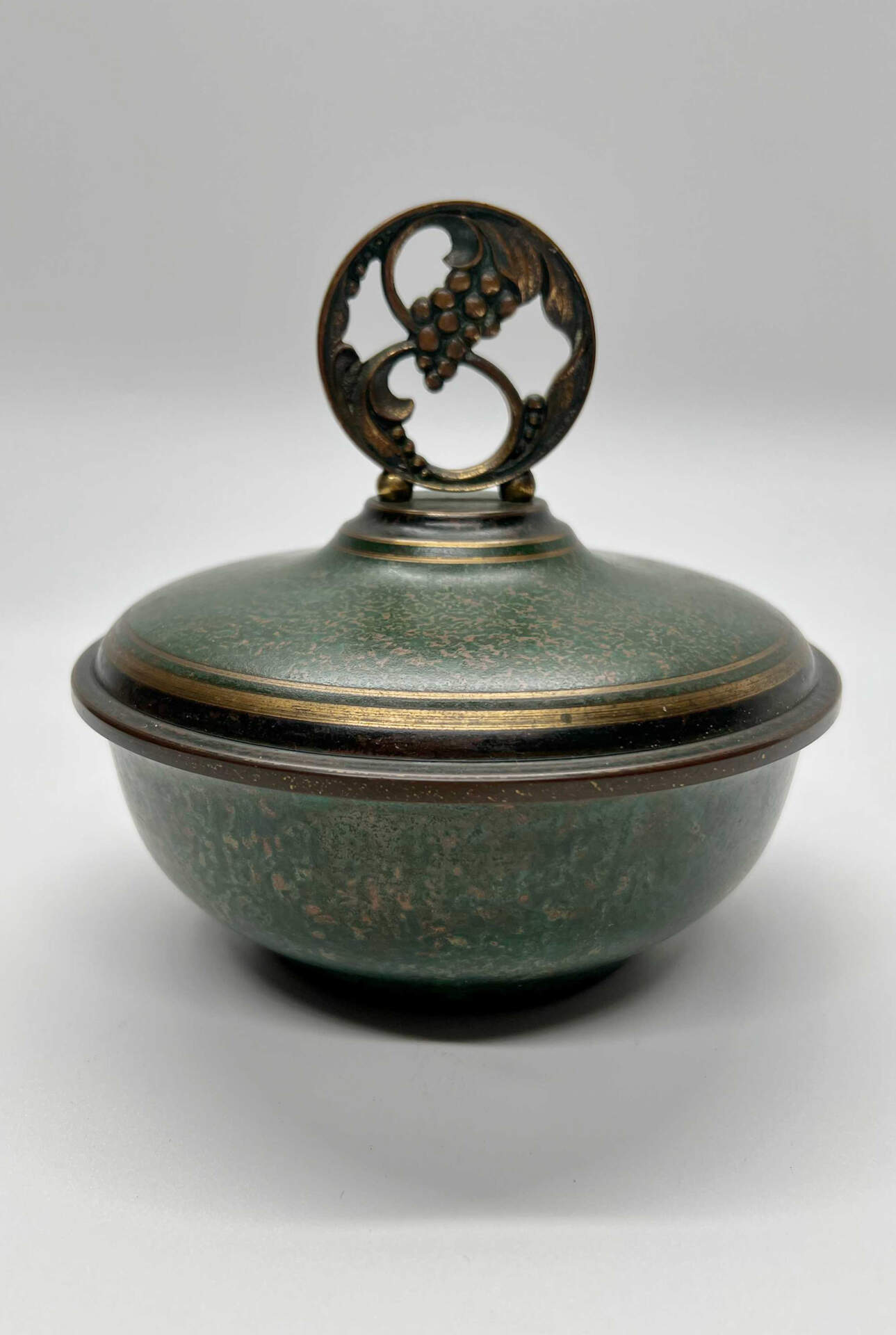 Standing Tall Grape Pattern Covered dish with Polished Interior
