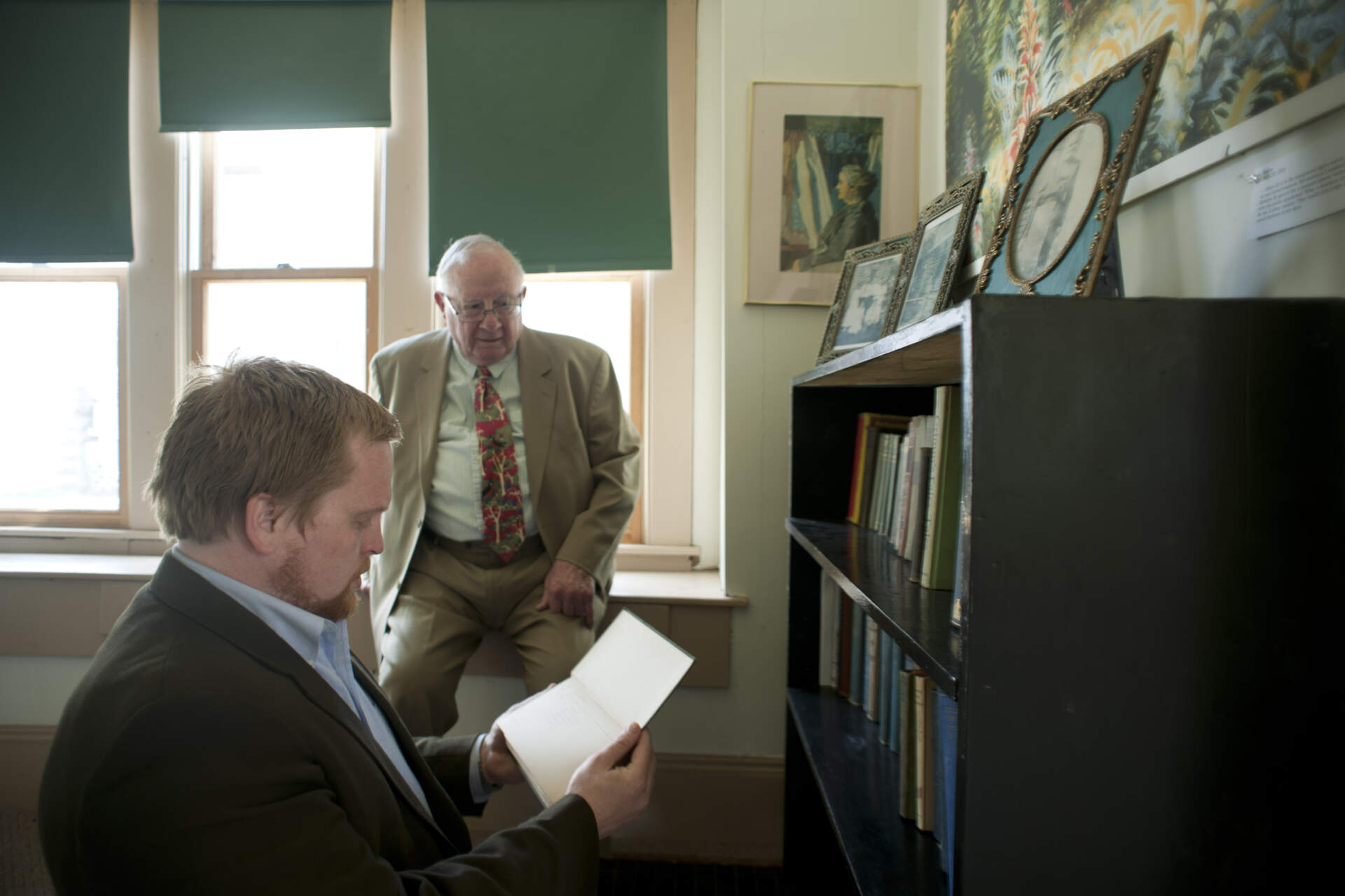 Tullis Johnson and Dick Wooten exploring Charles Burchfield's books