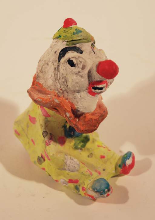 Untitled [Clown with yellow outfit]