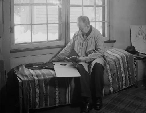 Burchfield in his Gardenville Studio With Records and a Book