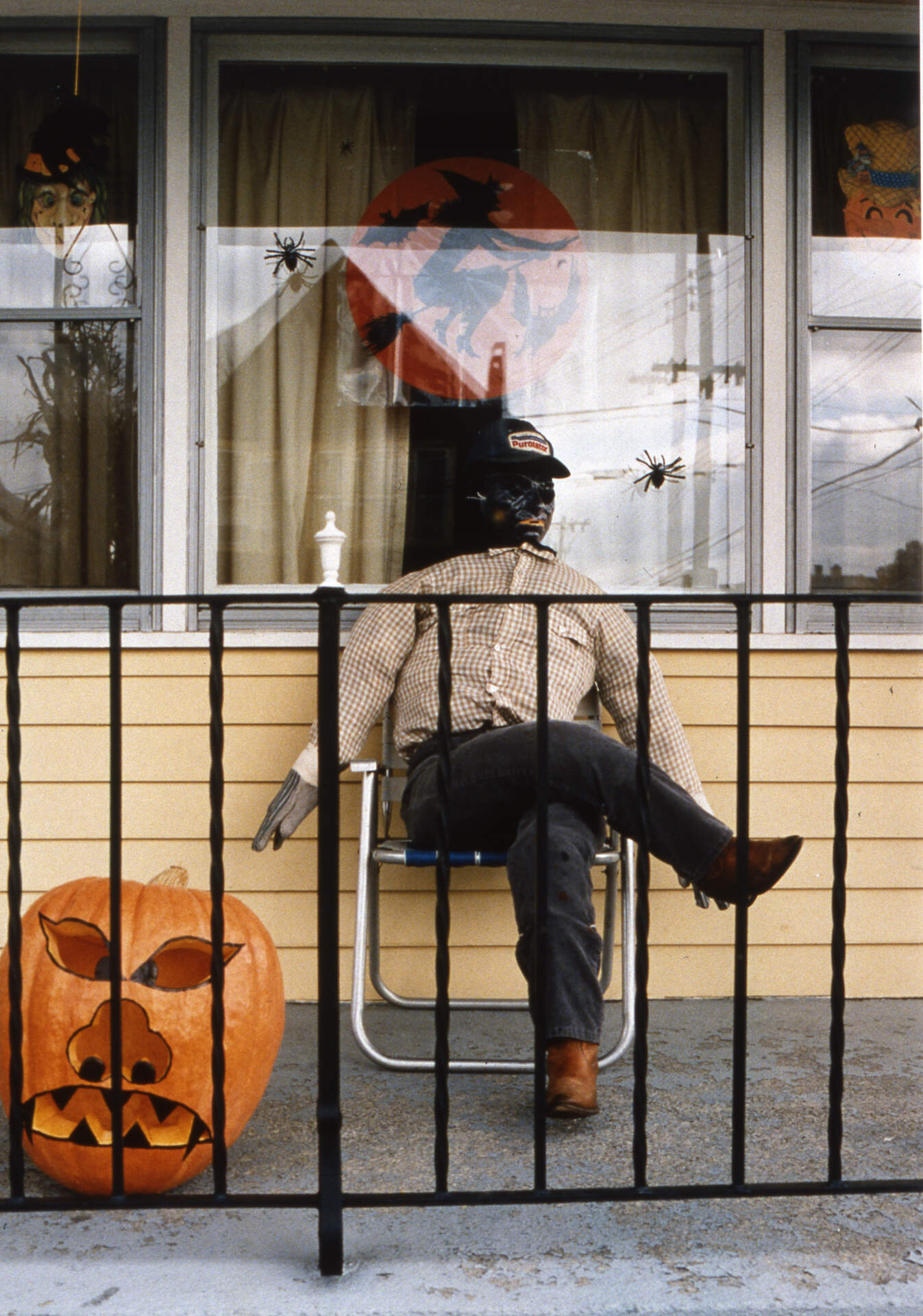 Porch dummy & jack-o-lantern, Swinburne St, Buffalo, NY, 1988
