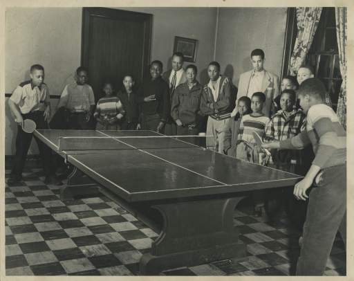 Boys playing table tennis