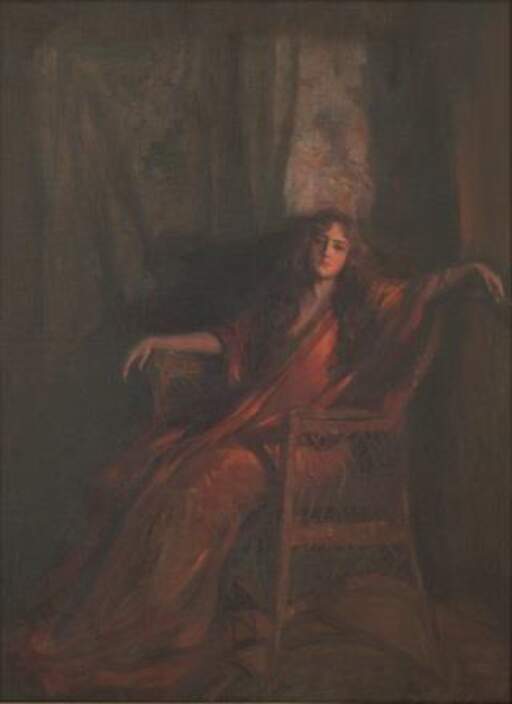 Untitled (Woman in red dress and shawl, seated in wicker chair with cigarette)