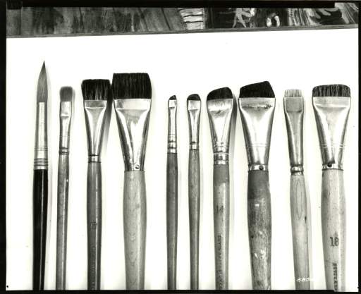 Photograph of ten of Charles Burchfield's paintbrushes